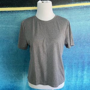 Purity Active grey top with gold writing on back